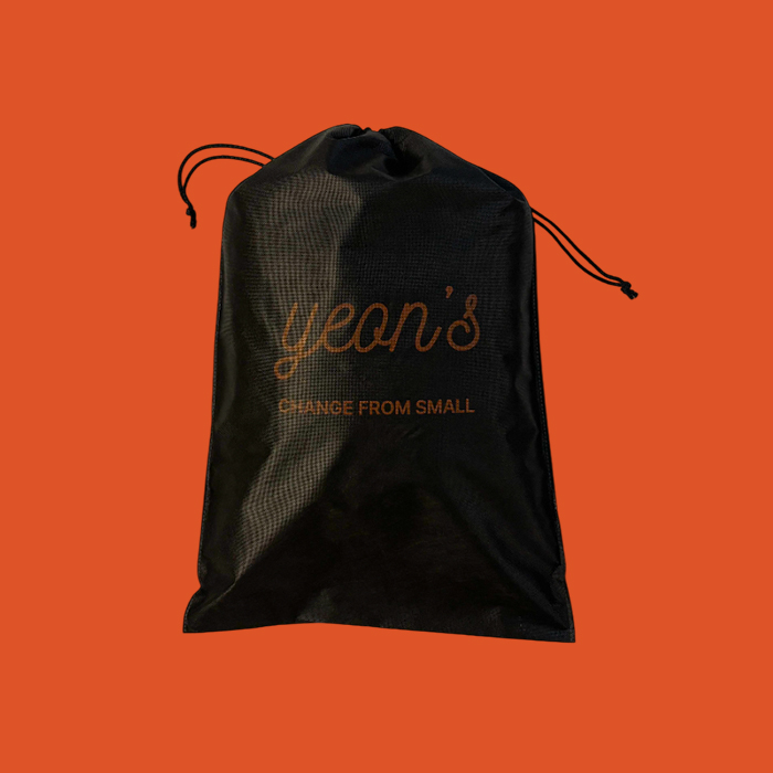 Check Jacquard Rug + Black Dust Bag